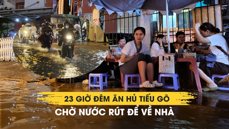 TP.HCM ngập nặng sau mưa lớn: 23 giờ đêm ăn hủ tiếu gõ chờ nước rút để về 