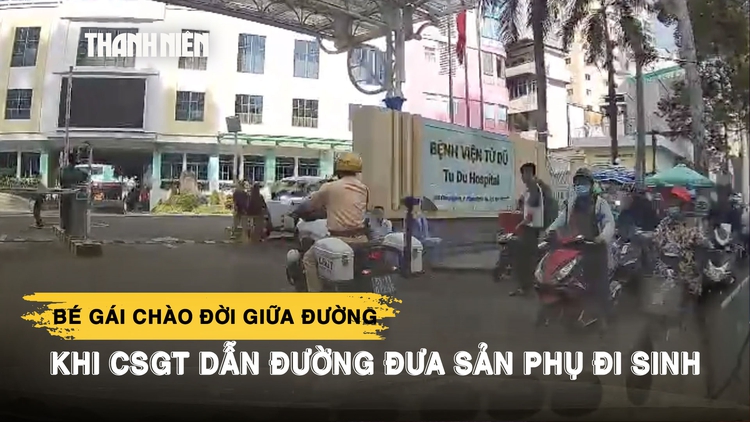 CSGT TP.HCM hú còi đưa sản phụ đi sinh, bé gái chào đời giữa đường