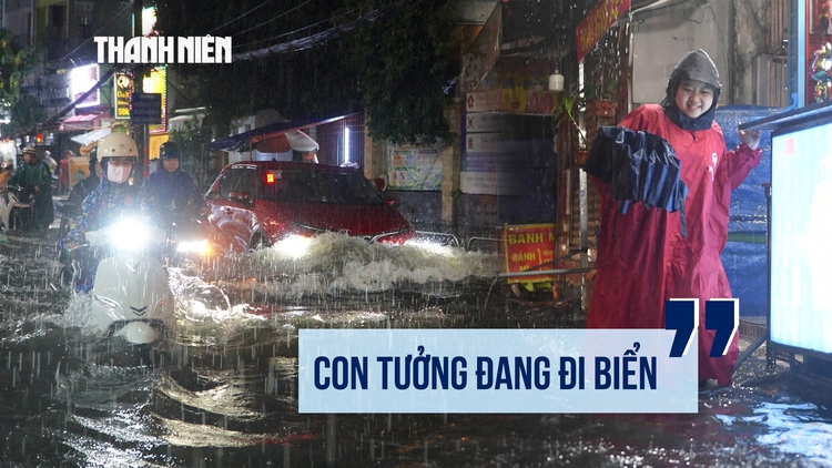 Đường D5 ngập gần 4 tiếng, sinh viên lội nước về nhà: 'Tưởng đang đi biển'