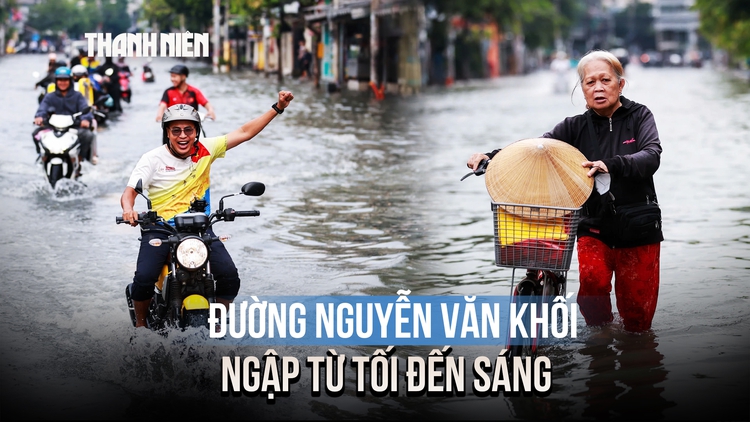 Đường Nguyễn Văn Khối ngập từ tối đến sáng, người dân chật vật dắt xe qua 'biển nước'