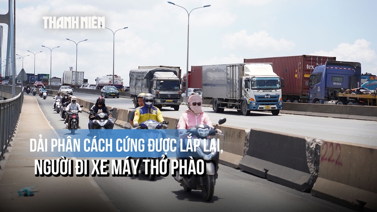 Chở con qua cầu Phú Mỹ, người mẹ nói gì khi dải phân cách cứng được lắp lại?