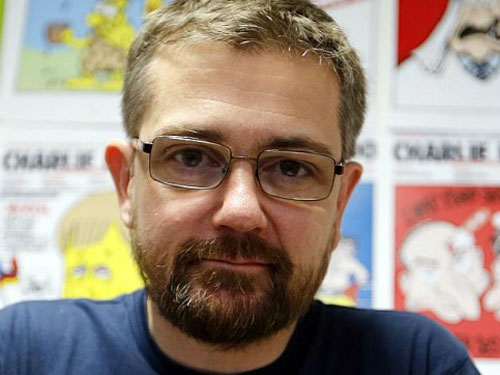 Tổng biên tập của Charlie Hebdo, ông Stephane Charbonnier bị sát hại - Ảnh: AFP