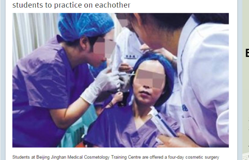 Một học viên thực tập thao tác tiêm lên người một học viên khác - Ảnh chụp màn hình trang tin Shanghaiist