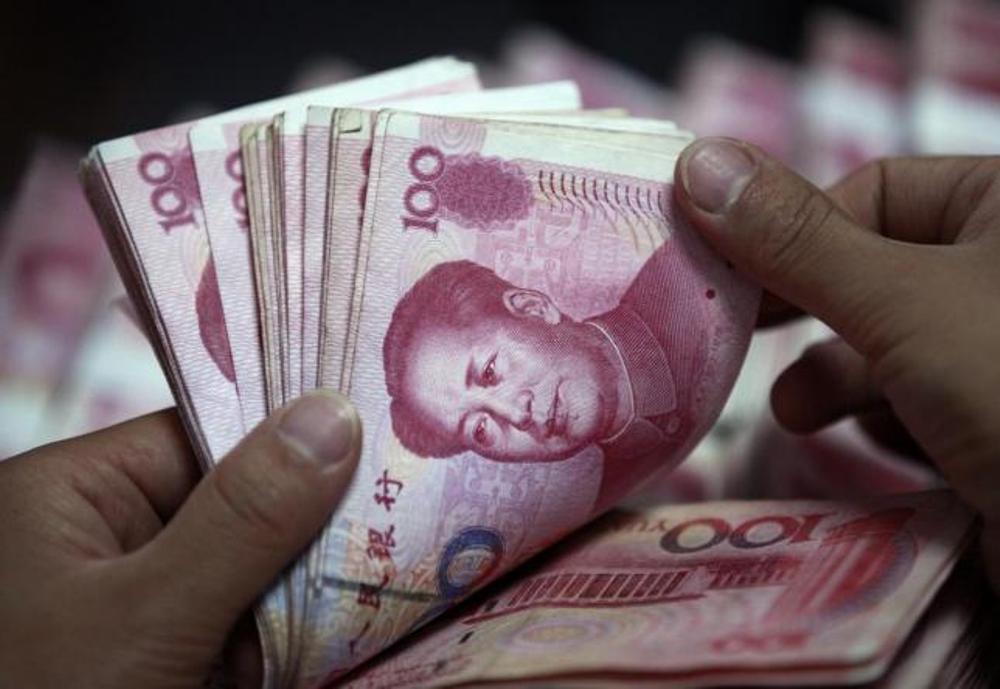 Trung Quốc đột ngột giảm giá đồng nhân dân tệ làm ảnh hưởng đến các thị trường tài chính toàn cầu- Ảnh: Reuters