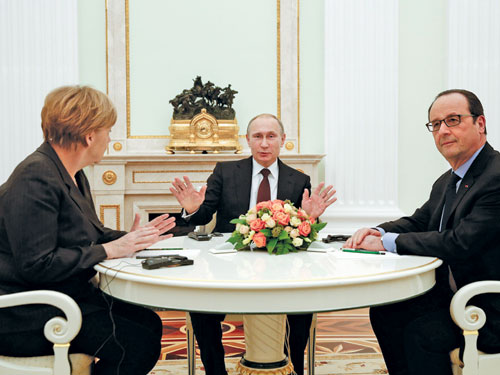 Các lãnh đạo Nga, Pháp và Đức chạy đua với thời gian để soạn thảo kế hoạch chấm dứt xung đột ở Ukraine - Ảnh: Reuters