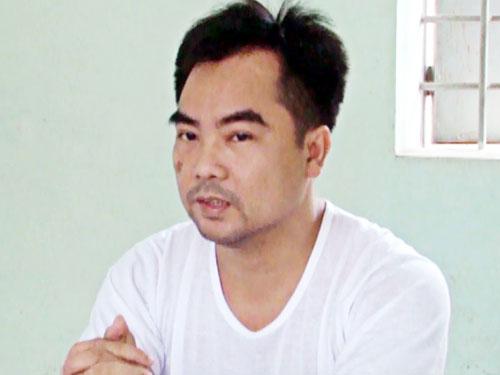 Trần Đình Hải khi bị bắt - Ảnh: Nguyễn Tú