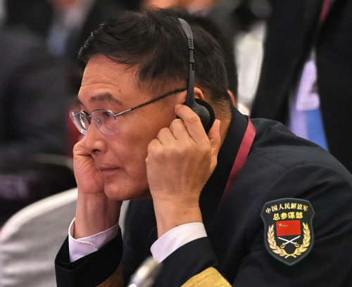Đô đốc Tôn Kiến Quốc tại SLD - Ảnh: AFP