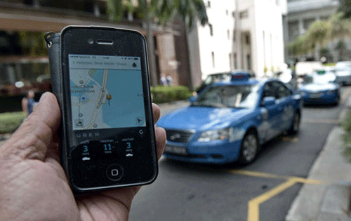 Sự tiện dụng và cách thức hoạt động đơn giản giúp Uber có giá thành rẻ - Ảnh: AFP