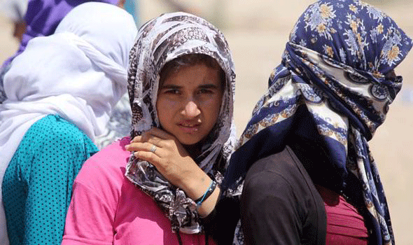 Theo thống kê của các lãnh đạo cộng đồng Yazidi ở Iraq, ít nhất 5.270 ngườ Yazidi đã bị bắt cóc hồi năm ngoái, trong đó số phận các bé gái là bi thảm nhất - Ảnh: AFP