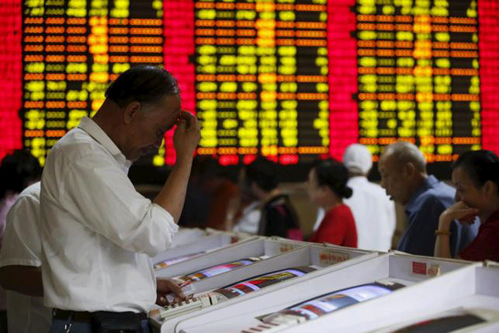 Thị trường chứng khoán Trung Quốc lao dốc gây những phản ứng tiêu cực trên toàn cầu - Ảnh: Reuters