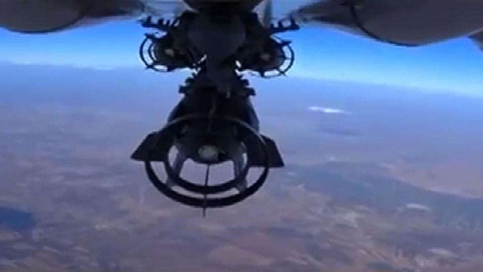 Máy bay Nga đang thả bom ở Syria - Ảnh: AFP