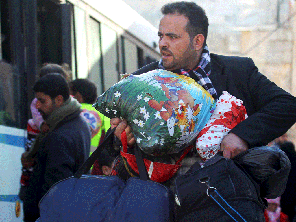 Chiến tranh leo thang ở Syria đã tạo ra làn sóng người tị nạn ào ạt đổ vào châu Âu - Ảnh: Reuters