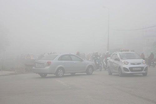 Sương mù dày đặc bao phủ Thành phố Thanh Hóa 4