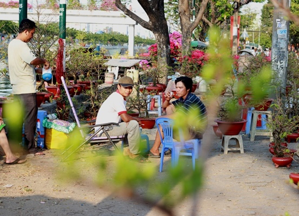 [Chùm ảnh] Nhọc nhằn mưu sinh mùa tết ở Sài Gòn 3