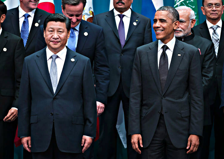 Ông Tập Cận Bình và Tổng thống Mỹ Barack Obama trong cuộc gặp ở Úc hồi năm 2014 - Ảnh: Bloomberg