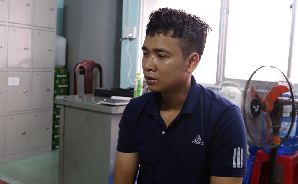 Nghi can Nguyễn Nghĩa tại Cơ quan điều tra Công an Bình Dương - Ảnh: Đỗ Trường