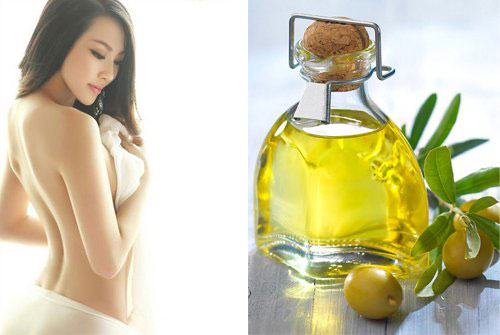 Massage ngực với tinh dầu dầu ô liu