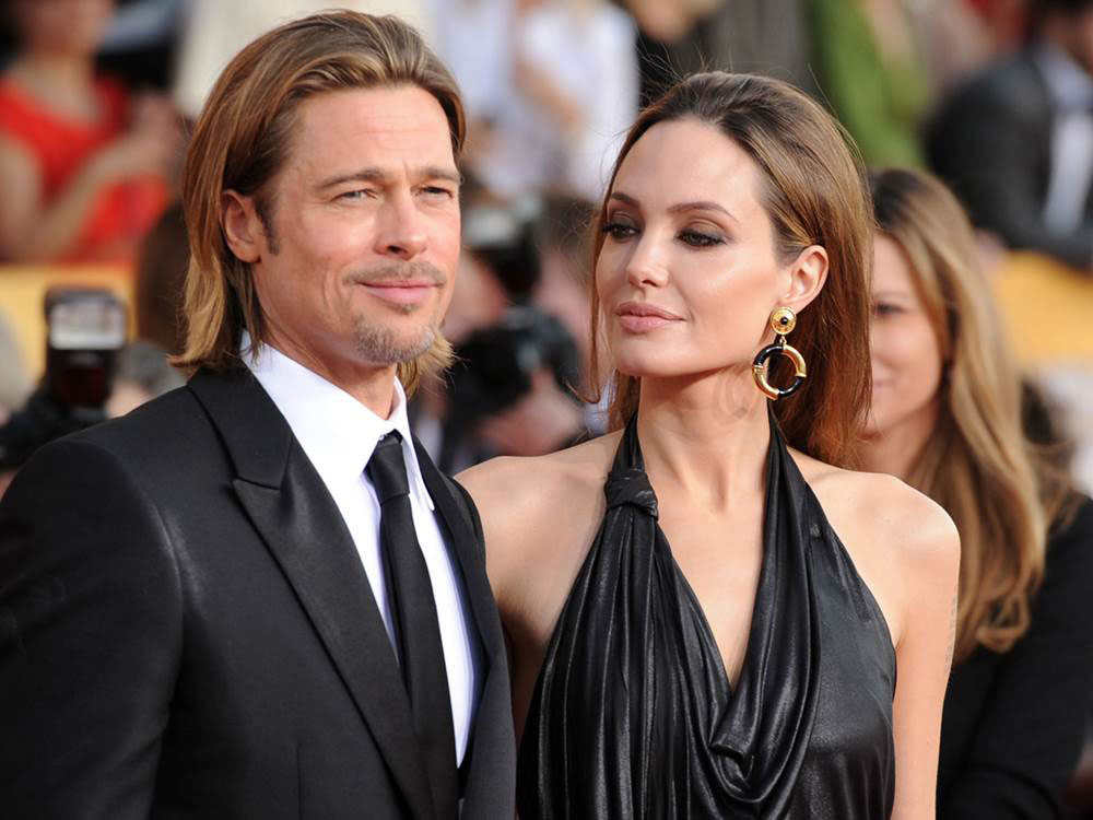 Angelina Jolie kiên quyết giành toàn quyền chăm sóc 6 con trong khi Brad Pitt muốn chia sẻ một nửa quyền nuôi con (Ảnh: Getty Images)