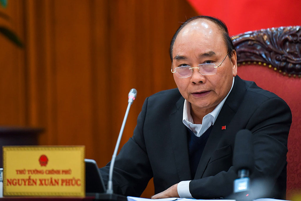 Thủ tướng Nguyễn Xuân Phúc chủ trì cuộc họp về phòng chống dịch chiều 17.2 ẢNH: VGP