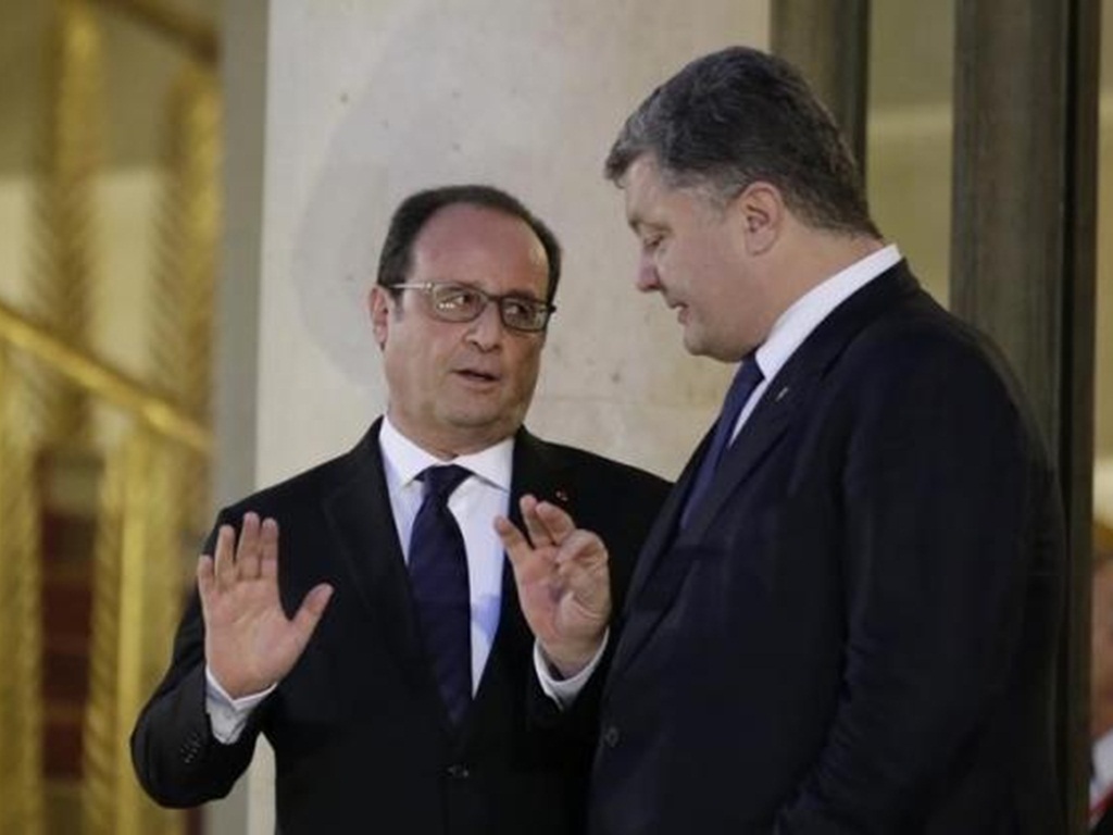 Bàn nghị sự ở Paris đã chuyển trọng tâm từ Ukraine sang... Syria - Ảnh: Reuters
