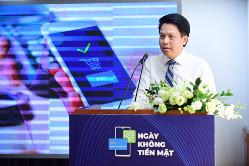 Ông Phạm Tiến Dũng – Vụ trưởng Vụ Thanh toán Ngân hàng Nhà nước - phát biểu tại cuộc họp báo