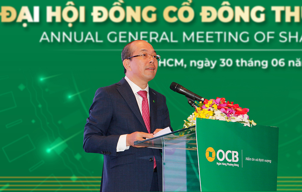 Ông Trịnh Văn Tuấn - Chủ tịch HĐQT OCB báo cáo tại đại hội