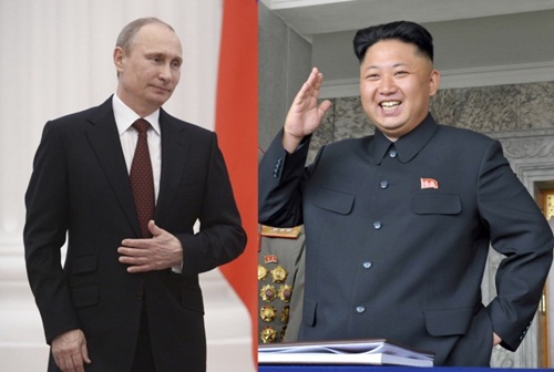 Ông Putin (trái) mời ông Kim Jong-un sang thăm Nga - Ảnh: Reuters