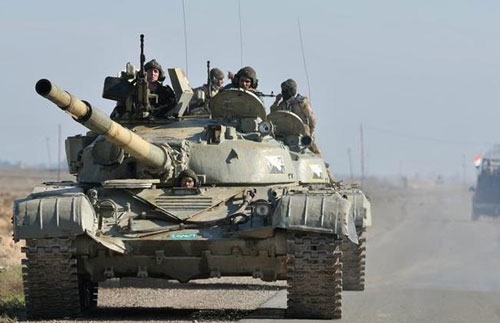 Xe tăng của quân đội Iraq ở gần Baghdad - Ảnh: Reuters