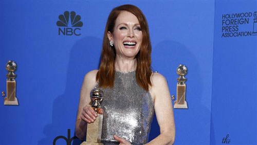 Julianne Moore đánh bại Reese Witherspoon giành giải Nữ diễn viên chính phim chính kịch xuất sắc nhất tại Quả cầu vàng 2015 - Ảnh: AFP