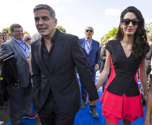Vợ chồng George Clooney - Ảnh: Reuters