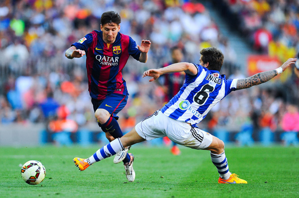 Messi (trái) có khả năng tạo nên những điều lớn lao từ những chi tiết nhỏ - Ảnh: AFP