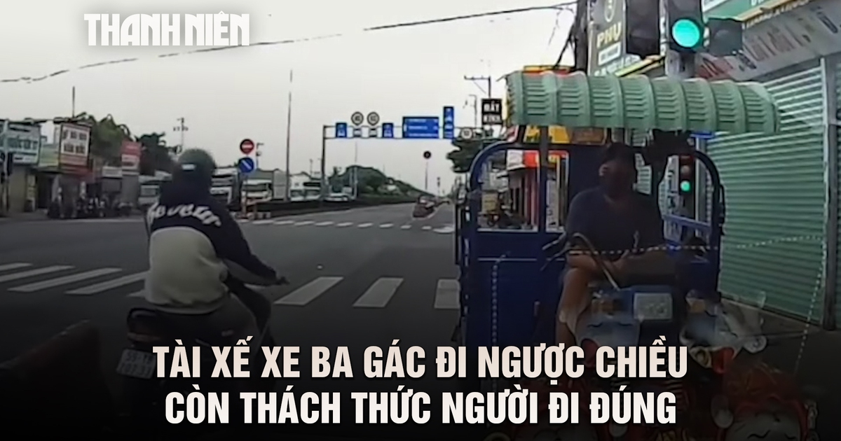 Tài xế xe ba gác đi ngược chiều còn thách thức xe đi đúng Tài xế xe ba gác đi ngược chiều còn thách thức xe đi đúng