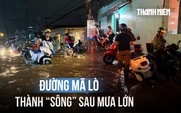 Đường Mã Lò ngập sâu sau mưa lớn, người dân chờ nước rút mới dám về nhà