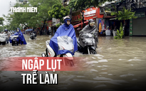 Trễ làm vì phố Thái Thịnh 'chìm' trong biển nước sau mưa lớn