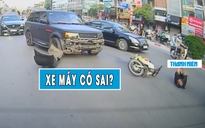 Xe sang Land Rover bị xe máy tông văng cản: Dân mạng tranh luận đúng – sai