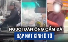 Xôn xao clip cầm đá đập nát kính ô tô ở TP.HCM