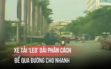 Xử phạt tài xế xe tải ‘leo’ dải phân cách qua đường cho nhanh 