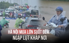 Hà Nội mưa lớn suốt đêm do bão số 5, người dân vật lộn giữa 'biển nước'