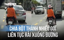 Xác minh clip người phụ nữ ngồi sau xe máy liên tục rải bột lạ gây hoang mang