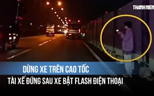 Dừng xe trên cao tốc, tài xế đứng sau xe bật flash điện thoại: Quá nguy hiểm!