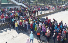 Công nhân Pouchen tràn ra QL1K phản đối chính sách tiền lương mới