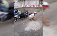 Khen thưởng thợ đá đục mảng bê tông trên mặt đường