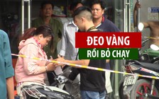 Cô gái trẻ đeo vàng vào người rồi bỏ chạy trước mặt chủ tiệm