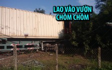 Hiện trường vụ xe container đâm sập tường rào, lao vào vườn chôm chôm