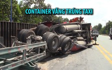 Tai nạn lật xe nguy hiểm, thùng container văng trúng taxi