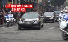 Người dân bên đường chào đón đoàn xe chở Chủ tịch Kim Jong-un đến Hà Nội
