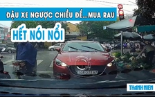 Nữ tài xế vô tư đậu ô tô ngược chiều tại đèn đỏ chờ…. mua rau