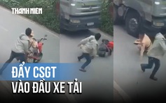 Hà Nội: Điều tra vụ người đàn ông đẩy chiến sĩ CSGT vào đầu xe tải về tội giết người!
