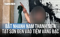 Clip nam thanh niên tạt sơn tiệm vàng bạc lúc rạng sáng rồi bỏ chạy