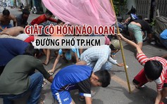 Dân mang vợt và rổ đi giật cô hồn, đường phố TP.HCM náo loạn